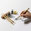 Premium glossy paper kit for Arabic calligraphy practice and smooth Islamic art writing.